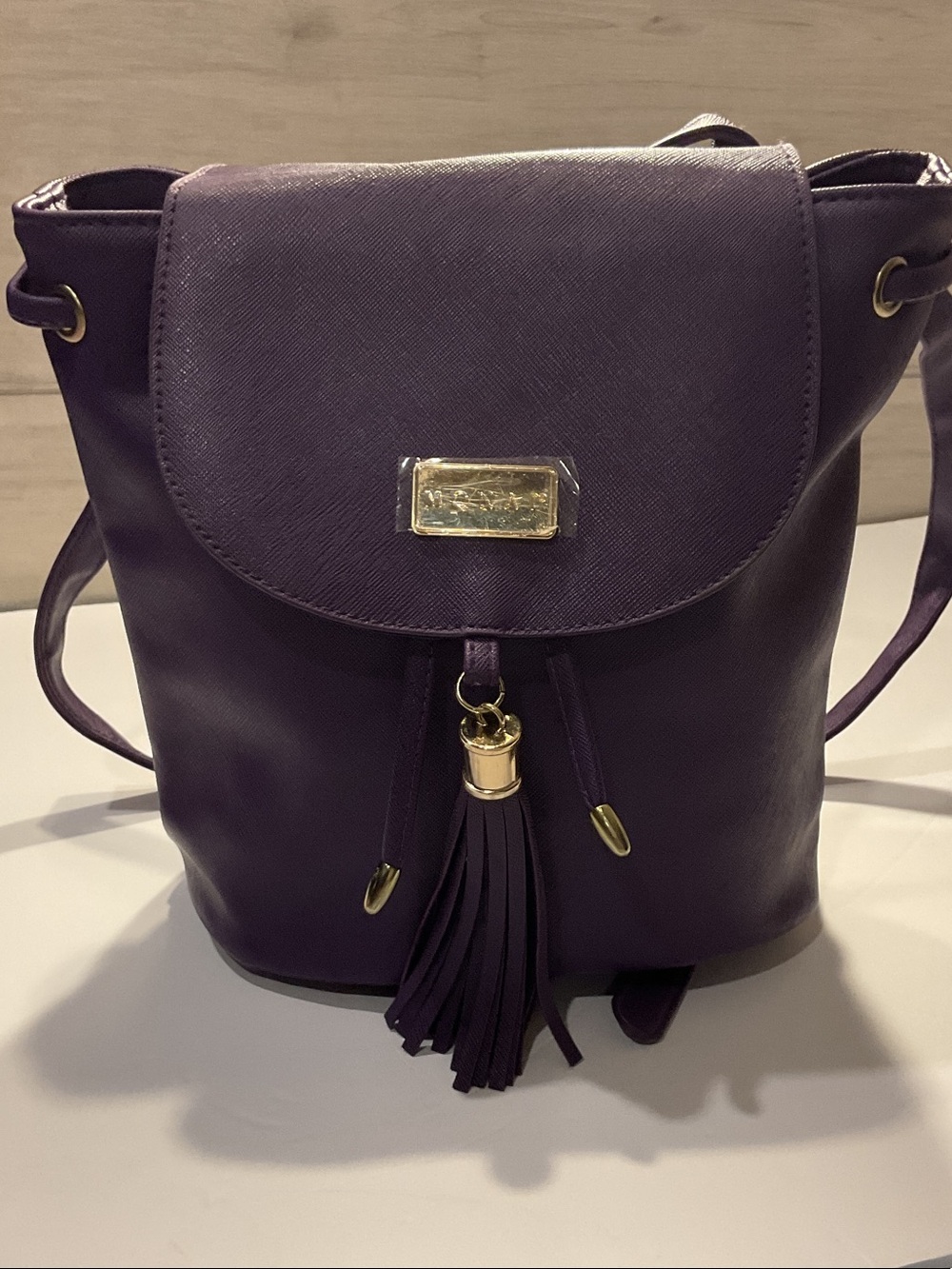 NWOT Women's Purple Tassel Drawstring Backpack with Gold Hardware